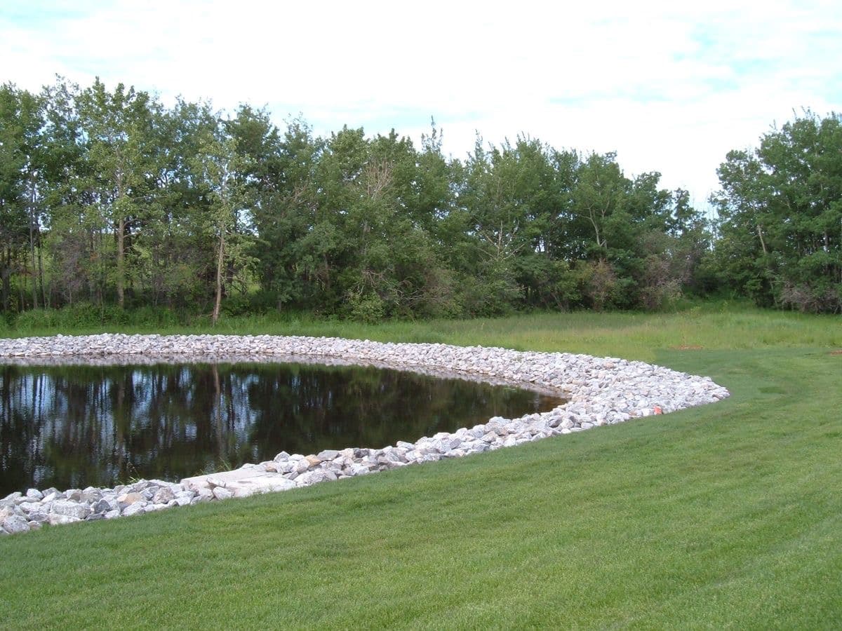 LES crew deploying inlet and water-quality protection ahead of site grading